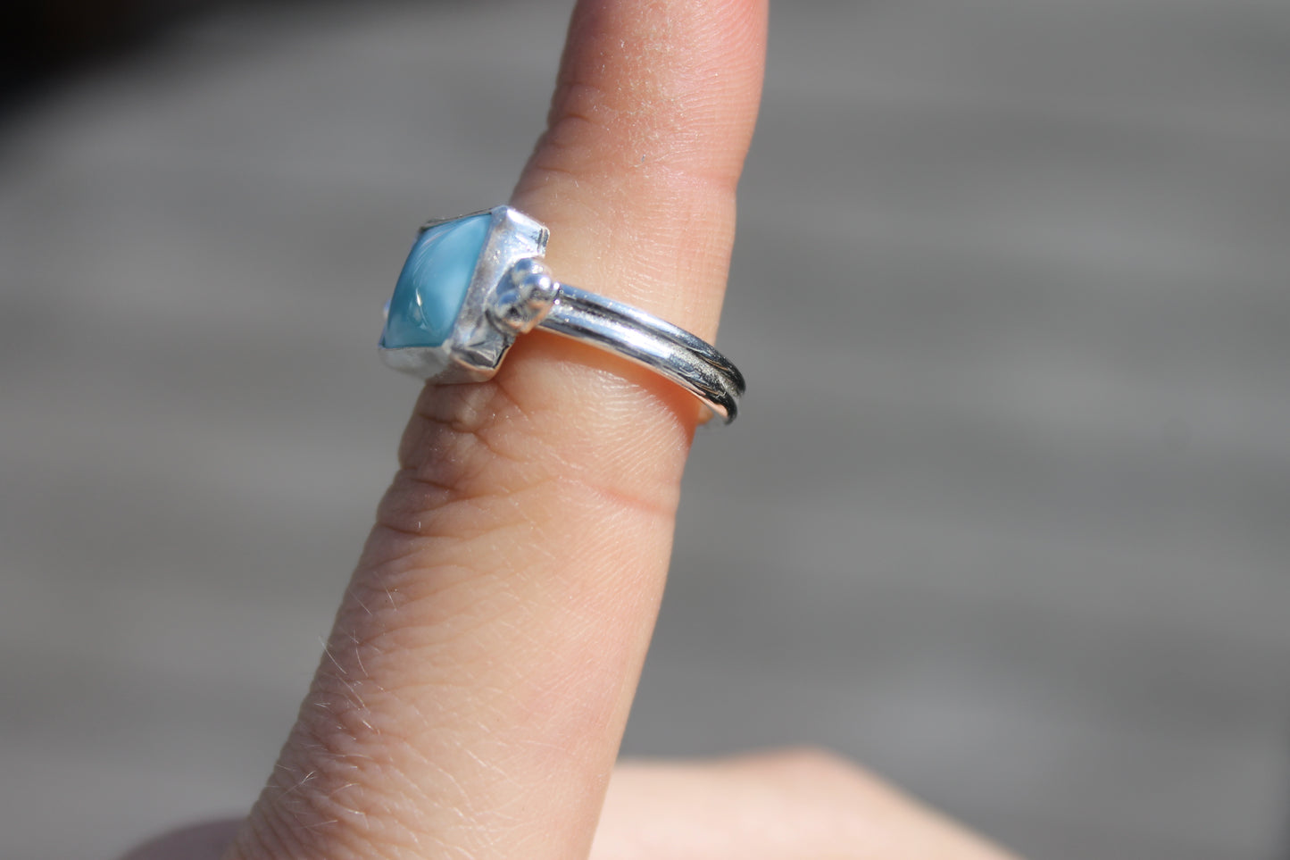 Larimar square with accents size 6.75